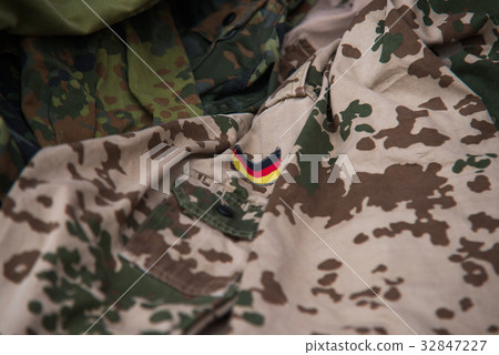 Close up on German flag on military uniform Close up on German flag on military uniform 32847227