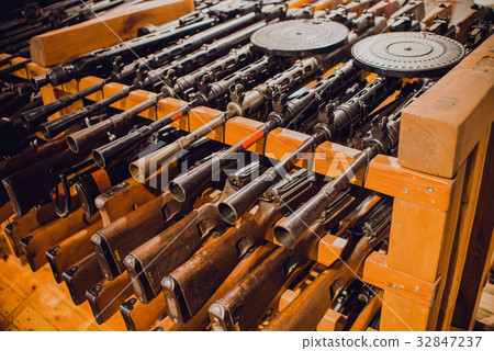 close up on old vintage assault rifles close up on old vintage assault rifles 32847237