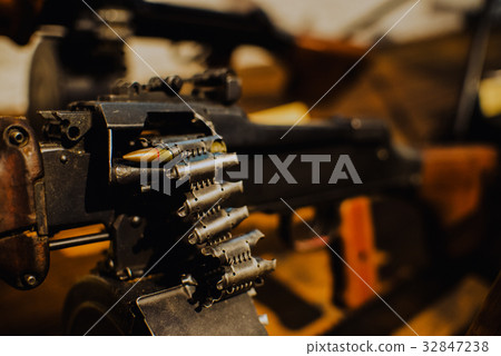 close up on last bullet in the machine gun close up on last bullet in the machine gun 32847238