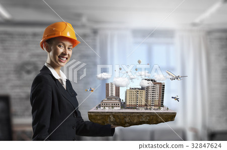 Woman presenting construction project. Mixed media Woman presenting construction project. Mixed media 32847624