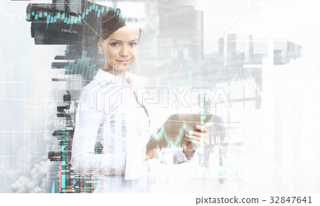 Businesswoman and modern city background. Mixed 32847641