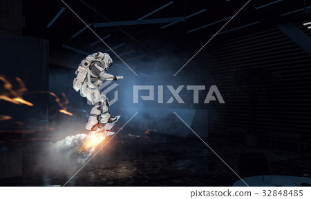 Astronaut surfing dark sky. Mixed media Astronaut surfing dark sky. Mixed media 32848485