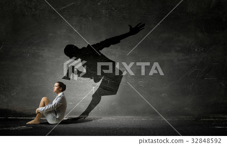 Businesswoman in empty room . Mixed media Businesswoman in empty room . Mixed media 32848592