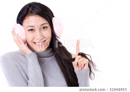 happy, smiling woman pointing up her finger happy, smiling woman pointing up her finger 32848955