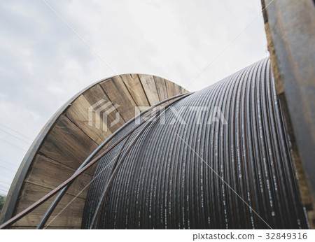 black wire electric cable with wooden coil black wire electric cable with wooden coil 32849316