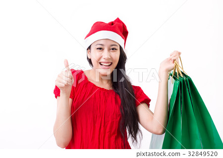happy woman enjoying christmas shopping 32849520