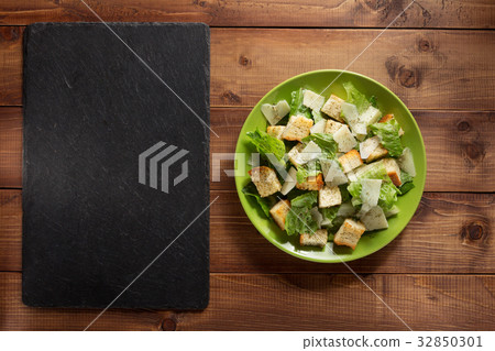 caesar salad in plate at wood caesar salad in plate at wood 32850301