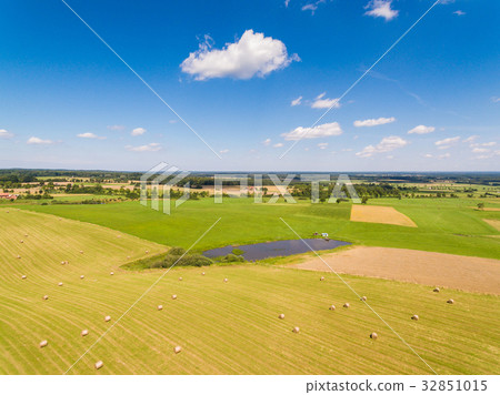 Field with haystacks Field with haystacks 32851015