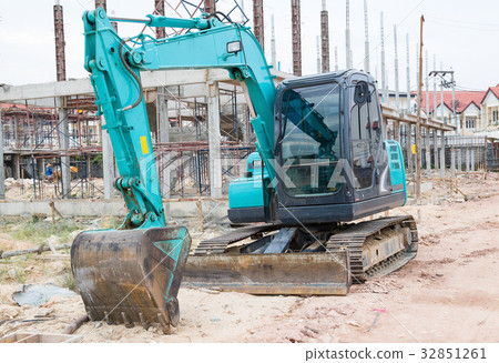 Land excavators green on construction site Land excavators green on construction site 32851261