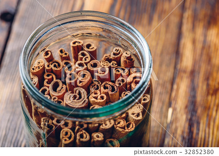 Jar of Cinnamon Sticks. 32852380