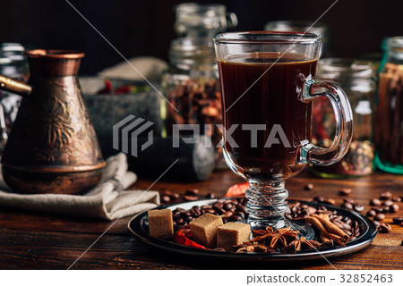 Cup of Coffee on Plate with Oriental Spices. 32852463