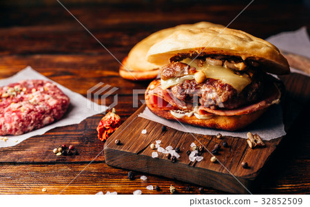 Cheeseburger on Cutting Board. 32852509