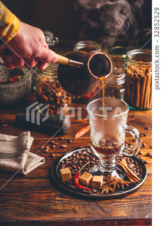 Man Pour Coffee in Mug. Man Pour Coffee in Mug. 32852529