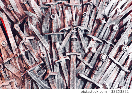 Metal knight swords background. Close up. The 32853821