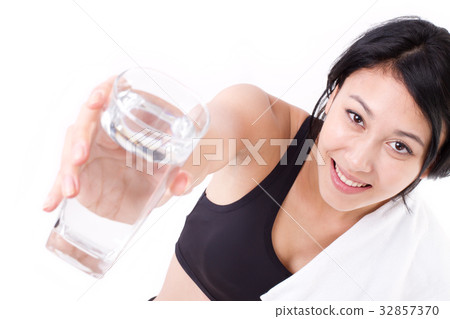 smiling, happy, healthy woman giving fresh water smiling, happy, healthy woman giving fresh water 32857370