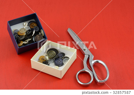 Collection of buttons in white and blue boxes Collection of buttons in white and blue boxes 32857587