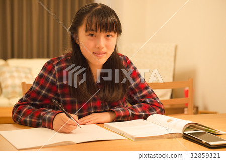 Girl studying for exam Girl studying for exam 32859321