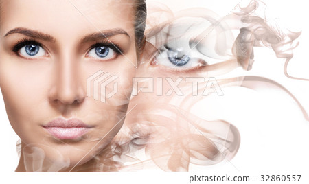 Double exposure portrait of woman and smoke. 32860557