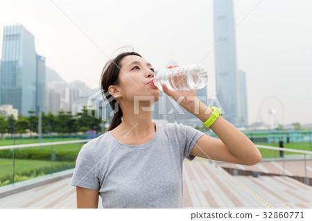 Asian Young Woman drink of the water bottle Asian Young Woman drink of the water bottle 32860771