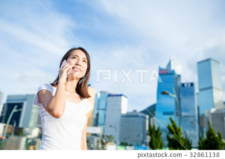 Woman talk to cellphone Woman talk to cellphone 32861138