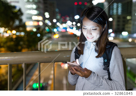 Woman using cellphone in Nagoya city Woman using cellphone in Nagoya city 32861845