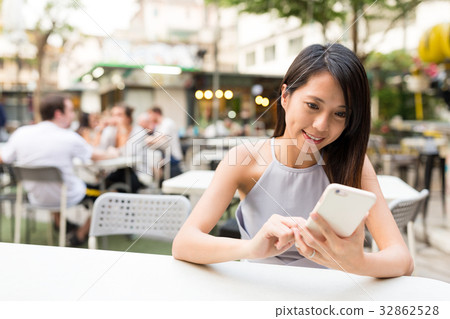 Woman wait for food in outdoor food market Woman wait for food in outdoor food market 32862528