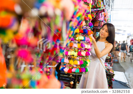 Woman shopping at Chatuchak weekend market 32862558
