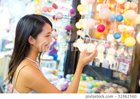 Woman shopping at weekend market 32862560