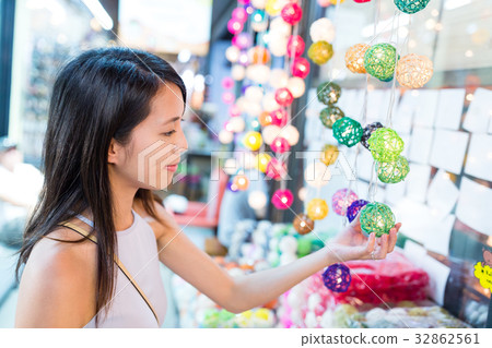 Asian Woman shopping in street market Asian Woman shopping in street market 32862561