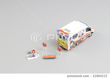 paramedics transport a patient to ambulance car 32864225