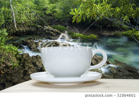 White coffee cup with blur background. White coffee cup with blur background. 32864601