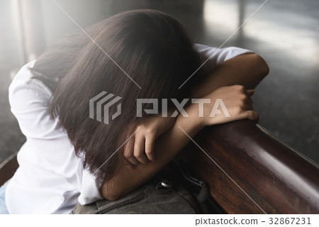 Sadness of Young Asian Backpacker Woman. 32867231