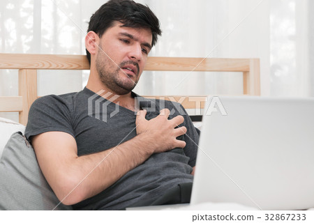 Businessman having heart attack. 32867233