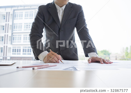 Engineer sketching architectural project Engineer sketching architectural project 32867577
