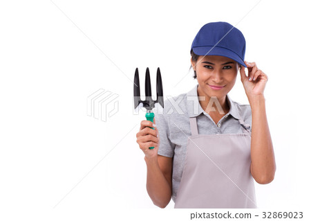 happy female gardener, hand holding cultivator happy female gardener, hand holding cultivator 32869023