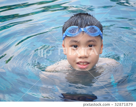 Asia boy at swimming pool. Outdoor 32871879