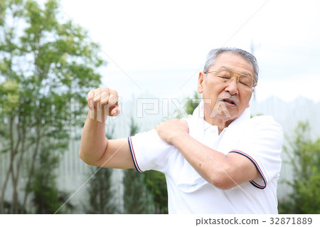 Senior man holding shoulders Senior man holding shoulders 32871889