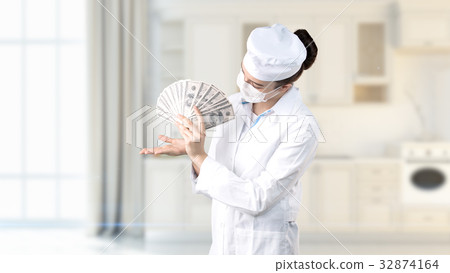 Beautiful medical woman doctor in uniform. Studio Beautiful medical woman doctor in uniform. Studio 32874164