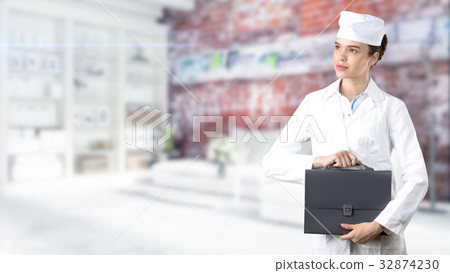 Beautiful medical woman doctor in uniform. Studio Beautiful medical woman doctor in uniform. Studio 32874230