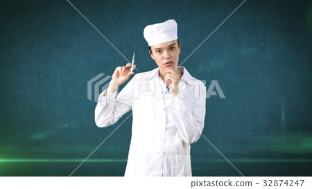 Beautiful medical woman doctor in uniform. Studio Beautiful medical woman doctor in uniform. Studio 32874247