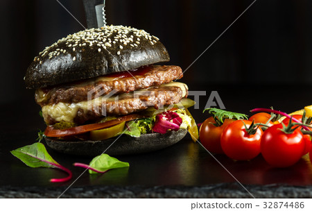 Black double hamburger made from beef, with 32874486