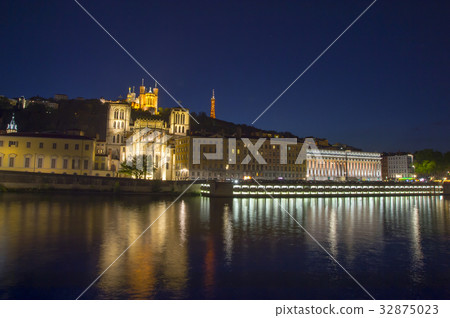 Night view Notre Dame Cathedral seen from the Saone river Night view Notre Dame Cathedral seen from the Saone river 32875023