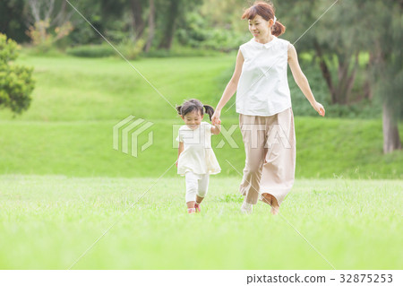 Mother and daughter take a walk Mother and daughter take a walk 32875253