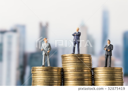 miniature model group of investor standing on coin miniature model group of investor standing on coin 32875419