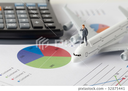 Miniature model of businessman thinking Miniature model of businessman thinking 32875441