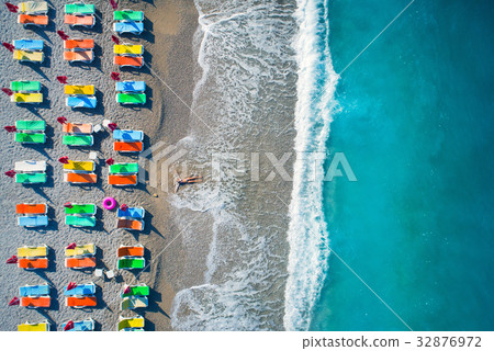 Aerial view of lying woman on the beach 32876972