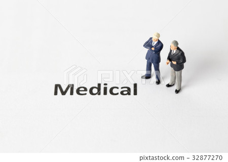 Miniature model of businessman standing medical Miniature model of businessman standing medical 32877270