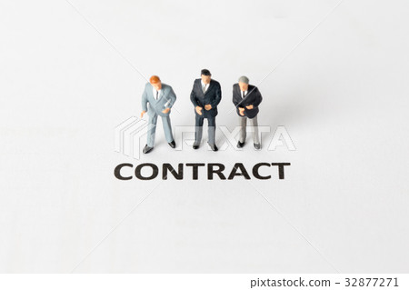 Miniature model of businessman standing contract 32877271