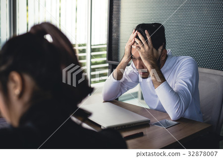 Asian business people working with serious emotion Asian business people working with serious emotion 32878007