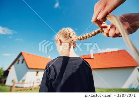 Girl with hair braids 32878071